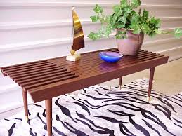 Providing a space to gather around, set down a cup of tea, or support the current book of choice, this essential piece completes a space. 15 Everlasting Mid Century Vintage Table Designs