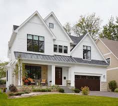 Black And White House With Wood Garage Door White Houses With Black Trim Inspiration Life On Virginia Street Modern Farmhouse Exterior Farmhouse Exterior House Exterior