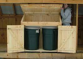 This trash can also features a secure latching design to help keep trash in and critters out. Trash Can Storage Shed Wood Garbage Can Storage