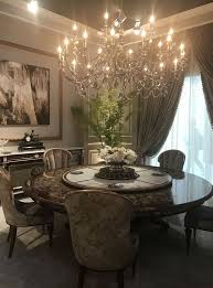 The floor is covered with a the windows were dressed with large silver curtains. Luxury Baroque Round Dining Table The Best Wood Furniture Luxuryfurnituredesign Luxury Dining Room Dining Room Style Vintage Dining Room