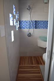 The vanity without cabinet can make a small bathroom feels much wider. Thai Style Micro Bathroom Addition Modern Bathroom Denver Houzz