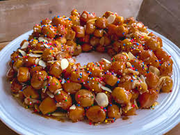 Little balls of pastry are deep fried and coated in honey; Stuffoli Neapolitan Christmas Dessert Feeling Foodish