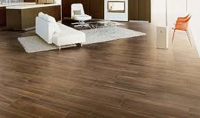 Maybe you would like to learn more about one of these? Dark Wood Look Tile For Contemporary Living Room Design Harmony In Chord By Marazzi Wood Tiles Design Tile Floor Living Room Living Room Tiles