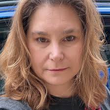 Who can cut thick long one layer hair into a specific style in the Oil City  area?