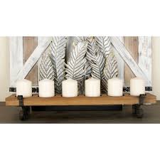 Wood planks are a renewable resource. Litton Lane 5 In Brown Iron And Wood Plank Candle Holder 55828 The Home Depot Candle Holders Wood Planks Wood Candle Sticks
