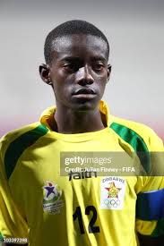 Ackim Mpofu of Zimbabwe looks