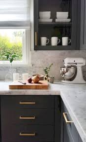Well for me it's cozy, comfy, simplistic, homely decoration which is based on minimal decoration and is not too flashy or gaudy. Modern Farmhouse Kitchen With Navy Kitchen Cabinets Dark Gray Kitchen Cabinets And Gold Beautiful Kitchen Cabinets Grey Kitchen Cabinets Navy Kitchen Cabinets