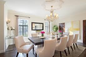 Black Dining Table With Ivory Velvet Dining Chairs And Yellow Abstract Art Transitional Dark Wood Dining Table Yellow Dining Room Dining Room Contemporary