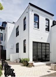 Black And White Bricks Design Brick Painted White Black Steel Framed Windows Brick Painted White Painted Brick Exteriors Exterior Brick