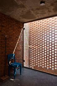 A Creative Brick House Controls The Interior Climate And Looks Amazing Brick Architecture Facade Design Facade House