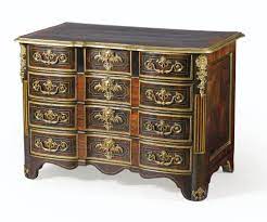 Commode En Placage D Ebene Et Palissandre A Monture De Bronze Dore D Epoque Louis Xiv Lot Sotheby Antique French Furniture Antique Furniture Commode Chest
