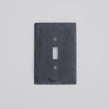 Switch plate covers—also called switch plates, or switch covers—belong to a bigger class of fixtures known as wall plates. Decorative Light Switch Cover Switch Plate Wall Plate Rustic Stone In Black G Light Switch Covers Decorative Light Switch Covers Light Switch Plate Cover