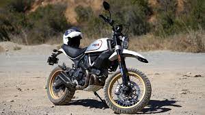 The ducati scrambler dirt tracker is an awesome machine. Ducati Scrambler Desert Sled Tackles Road And Dirt With Equal Aplomb Robb Report