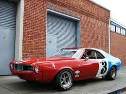 360ci bored.60 over 650cfm demon carb big cam high comp pistons 390 heads switched from points to newer msd better air intake then what you see hd clutch 4 speed hurst race seats those original cragars. Amc Javelin Trans Am Photos News Reviews Specs Car Listings Amc Javelin Trans Am Amc