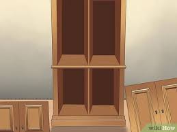 I have a tv cabinet that is a walnut finish can i white wash on top of a store bought piece of furniture. How To Whitewash Cabinets 12 Steps With Pictures Wikihow