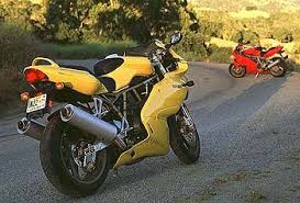 Image result for Nuget Yellow 1999 Motorcycle