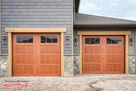 Garage Door That Leaves An Impression Garage Doors Prices House Exterior Garage Doors