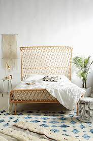 Poplar plywood, rattan, clear acrylic lacquer. Pari Curved Rattan Bed Anthropologie