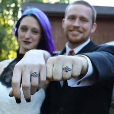 Some people get wedding ring tattoos as a place holder until they can afford a real ring. 50 Matching Wedding Ring Tattoos For Couples 2020