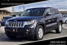 Image result for Brilliant Black 2012 Grand Cherokee