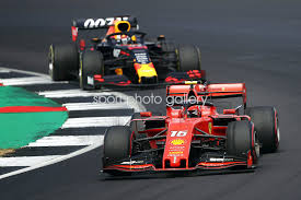 Max verstappen of the netherlands driving the (33) red bull racing rb16b honda and lewis hamilton of great britain driving the (44) mercedes amg petronas f1 team mercedes w12 compete for position. Charles Leclerc Vs Max Verstappen F1 British Gp 2019 Motor Racing Posters