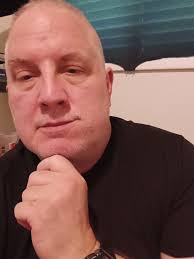 Young Blade *David Kinloch* Moonlight becomes blades, blades moon- light as  they lilt and pivot out of shadow into yellow pools: I make a point and  stop: steam breath into air