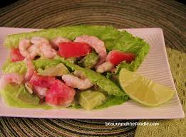 A simple shrimp ceviche for beginners made with poached shrimp instead of raw and finished with tomato, avocado, and cilantro. Coconut Lime Shrimp Ceviche