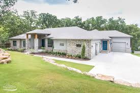 Custom Home Builder Tulsa Ok Home Exterior With Siding And Rock 3 Car Garage Custom Home Builders House Exterior New Home Construction