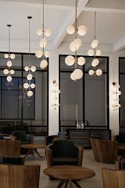 The Aged Brass Modernrail Wall Light By Tech Lighting Showcases The Sophistication Of Modernrail But With Living Room Lighting Design Hotel Light Tech Lighting