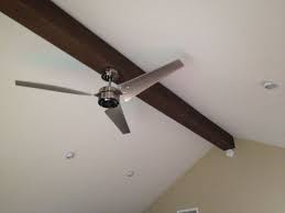A Single Ceiling Beam Is Simple Yet Elegant Faux Wood Workshop Ceiling Beams Faux Beams Vaulted Ceiling Beams