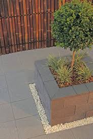 Adbri Premium Versastone Interlocking Retaining Wall System Will Enhance Your Home By Adding Depth D Patio Garden Design Garden Pavers Pool Landscaping