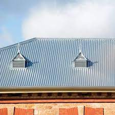Always wear heavy gloves and safety googles when working on this roof installation project. Heritage Galvanised Finish Revolution Roofing