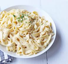 This easy light alfredo sauce recipe is perfect for special occasions but easy enough to make on busy weeknights! Fettuccine Alfredo Modern Honey