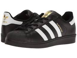 Adidas Black And Gold Trainers Womens Adidas Originals Superstar In 2020 Adidas Originals Superstar Black Lace Shoes Adidas