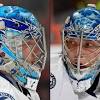 Tampa bay lightning goaltender andrei vasilevskiy deflects a shot out of play using his goalie mask to keep the scored tied in the 1st period. 1
