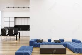 Free delivery & warranty available. White Living Room Corner With A Long Blue Sofa A Square Coffee Stock Photo Picture And Royalty Free Image Image 92872375