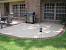 Concrete Patio With Brick Inlay