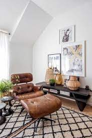 It features furniture and accent pieces with clean, sharp angles and rounded lines. Moderni Byt Pavel Stanek A Jeho Omlazene Bydleni Eames Chair Living Room Lounge Chairs Living Room Eames Lounge Chair Living Room