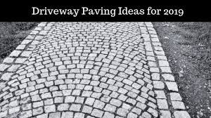 My favorite part of this particular driveway design is the dwarf fruit trees and rose hedges that line the perimeter of the grass. Inspirational Driveway Paving Ideas For 2020