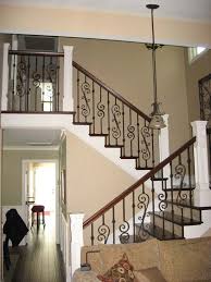 Pin By Shay Falch On Iron Stair Rails Staircase Remodel Wrought Iron Stair Railing Wrought Iron Stairs