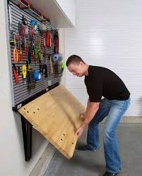 How To Build A Wall Mounted Folding Workbench Garage Makeover Garage Organization Diy Garage
