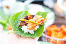 Sprinkle sesame seeds over chicken. How To Enjoy Ssam Korean Lettuce Wraps With Different Greens Kimchimari