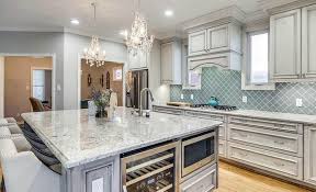 The beautiful tile work paired with the wood accents really warm up the modern kitchen cooking space. Arabesque Tiles Design Ideas Designing Idea