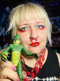 Tattoo artist painted a creature bathroom mural