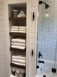 Perfect for anyone without a linen closet, nail a tiered shelf over the door frame to keep towels and linens within reach. 54 Bathroom Towel Storage Ideas Home Diy Bathroom Decor Towel Storage