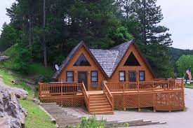 All of our cabins are custom built and accented with log railing and many other custom log accents. Roosevelt Cabin