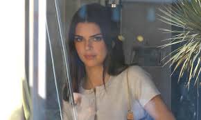This is the first step on how to create the kendall jenner haircut with a top knot. Kendall Jenner Shows Her Beauty In Makeup Free Selfie