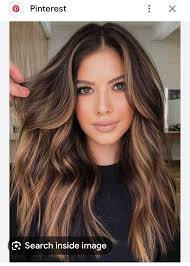 Vibrant red hair color and haircut