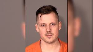 St. Paul man charged after 'voices in his head' told him to kill a retired  priest