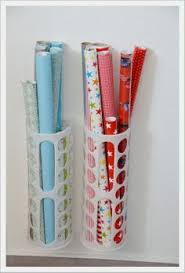 Ikea Tutensammler Anders Genutzt Und Einfach An Die Wand Montiert Ordnung In Der Geschenkpapier Fabrik Variera Tuten Ikea Hack Craft Room Craft Paper Storage